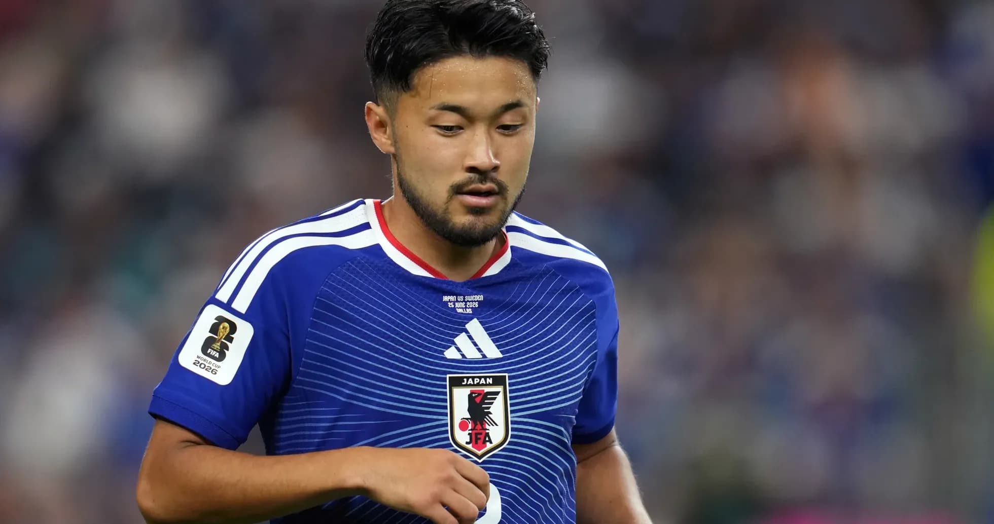 Jugador de Japón en partido con camiseta azul
