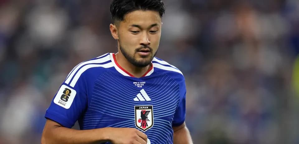Jugador de Japón en partido con camiseta azul