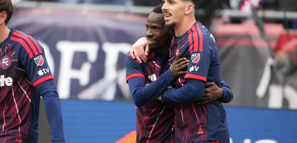 Jugadores celebrando un gol de New England II