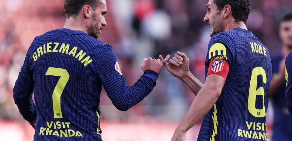Griezmann y Koke celebrando durante un partido