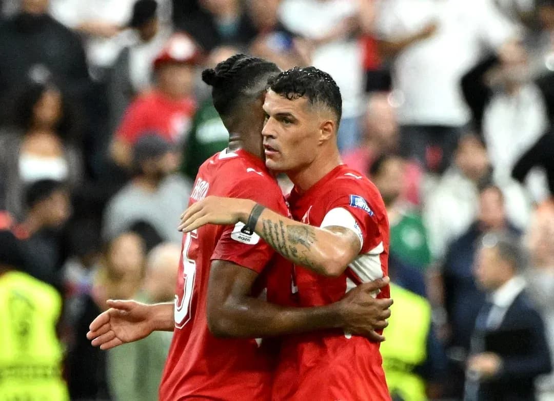 Jugadores suizos celebrando durante el partido