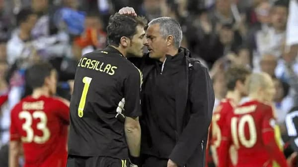 Iker Casillas conversing with José Mourinho post-match