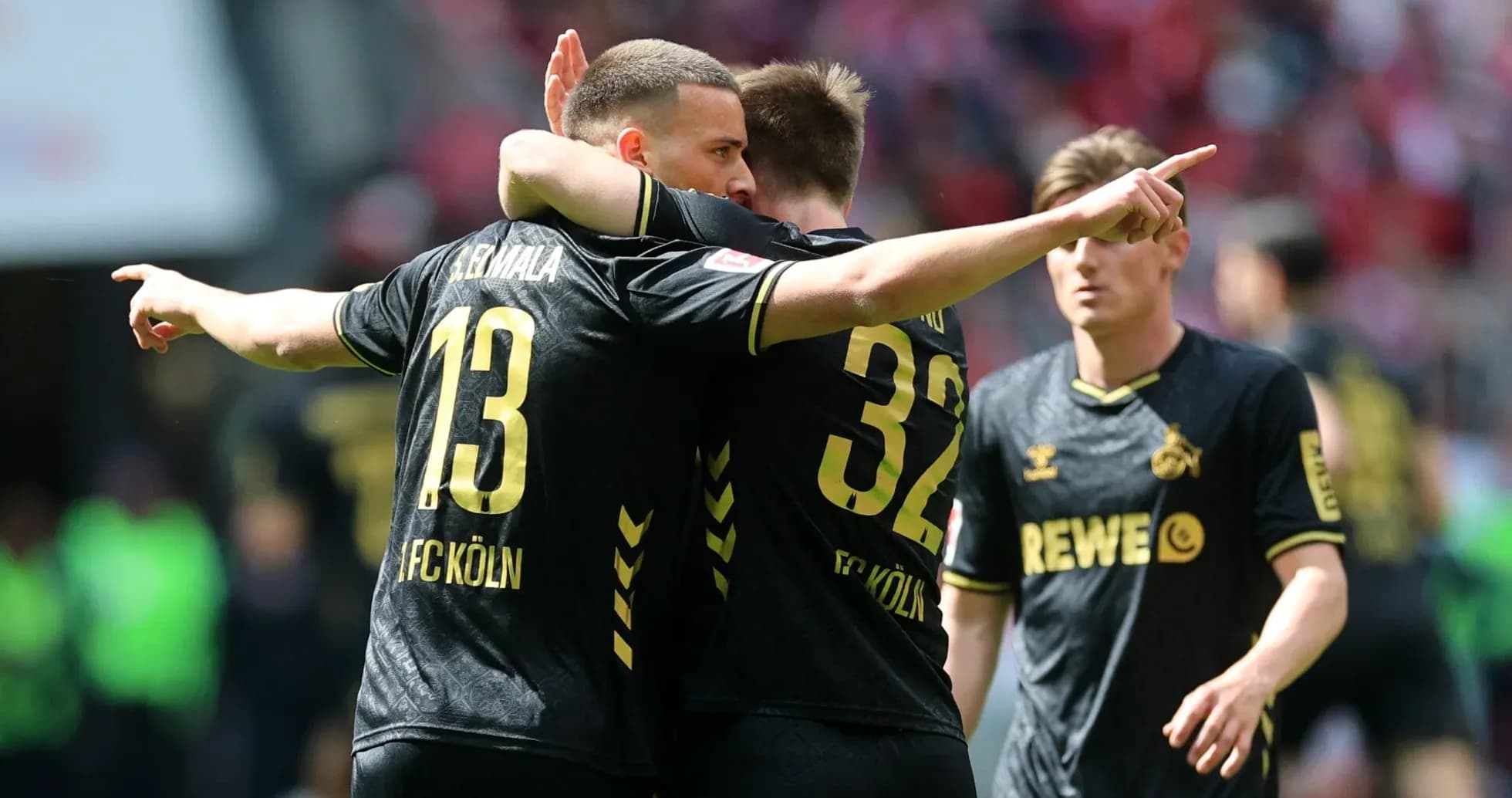 Jugadores de FC Köln celebrando un gol juntos Jugadores de FC Köln celebrando un gol juntos
