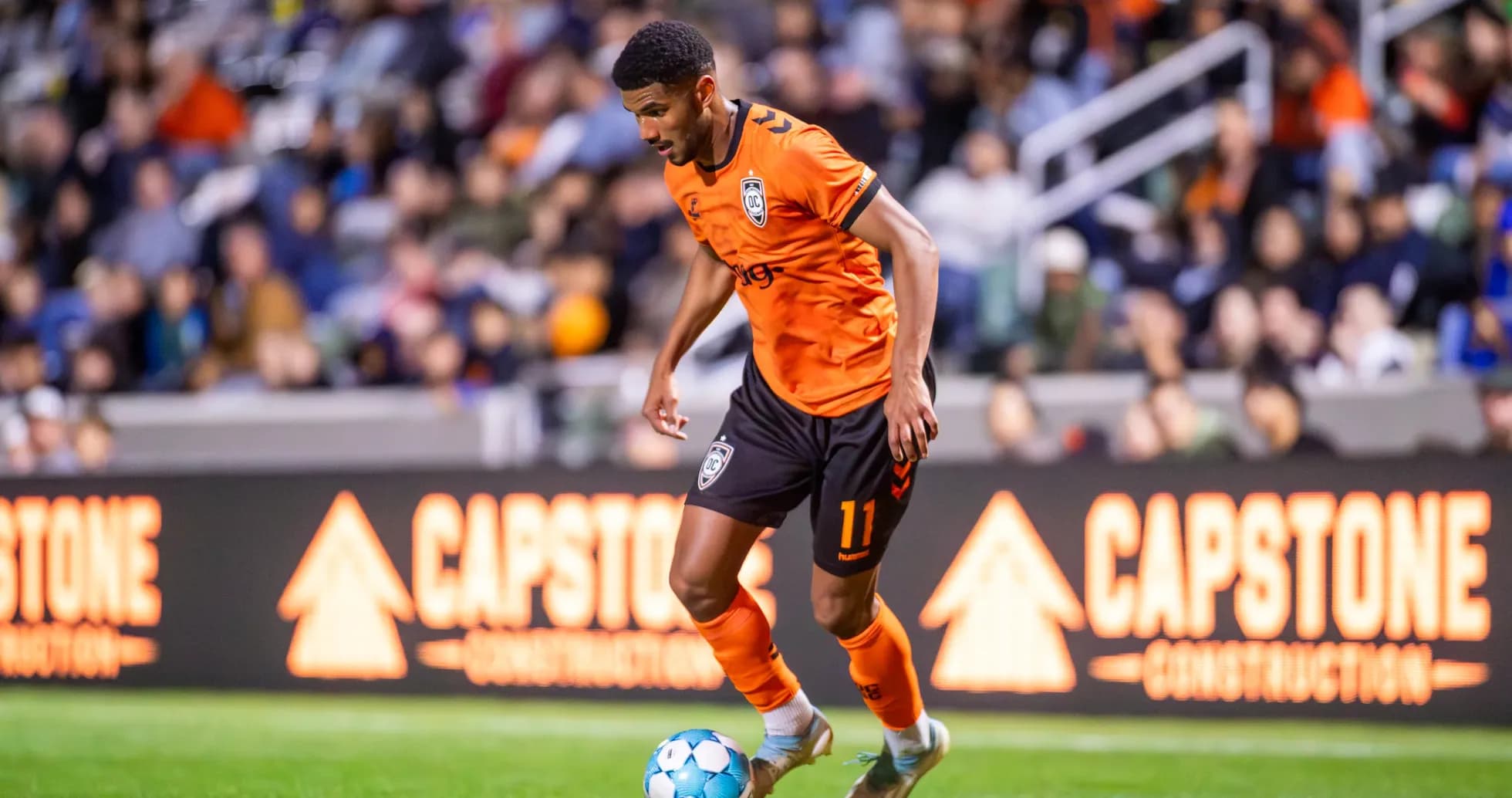 Jugador de Orange County SC en acción Jugador de Orange County SC en acción